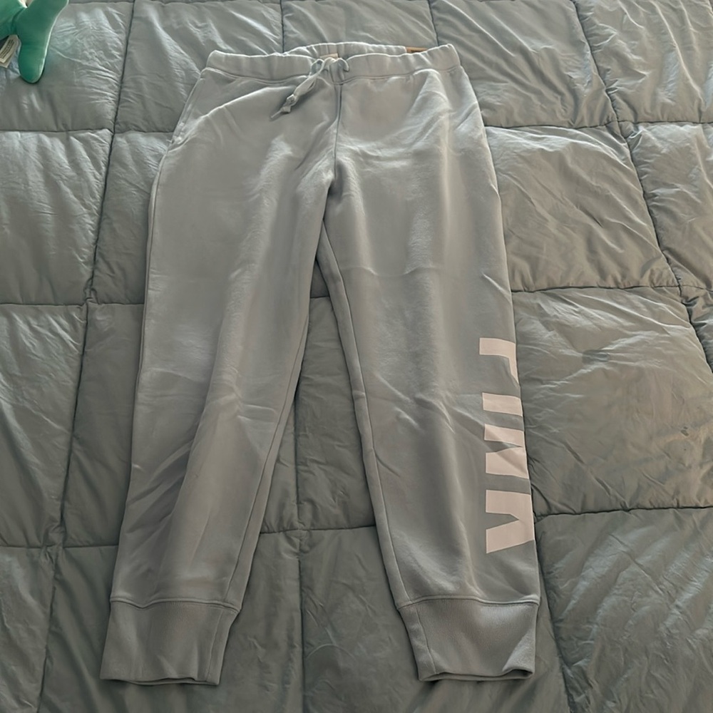 Brand new with tags Pink women’s sweatpants size large light blue